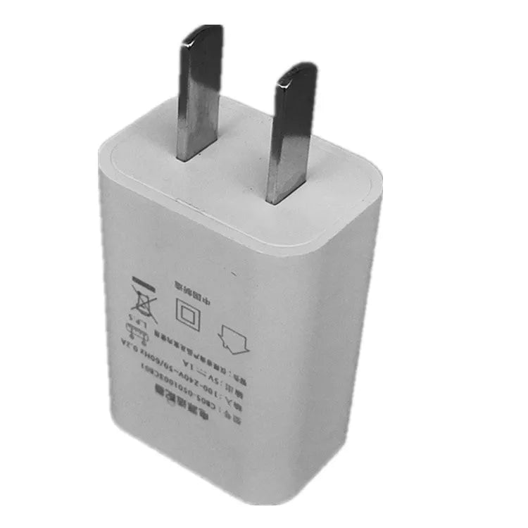 Thin CE FCC certified 5V 1A USB smartphone charger on white background