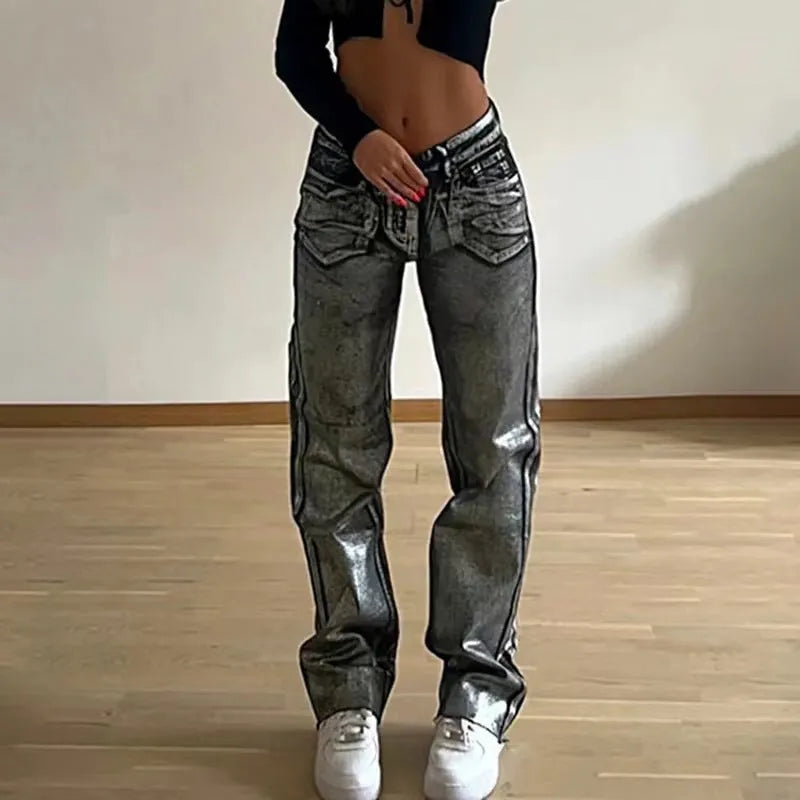 High waist straight leg blue jeans with hot silver contrast details on a model, showing the street hipster style.