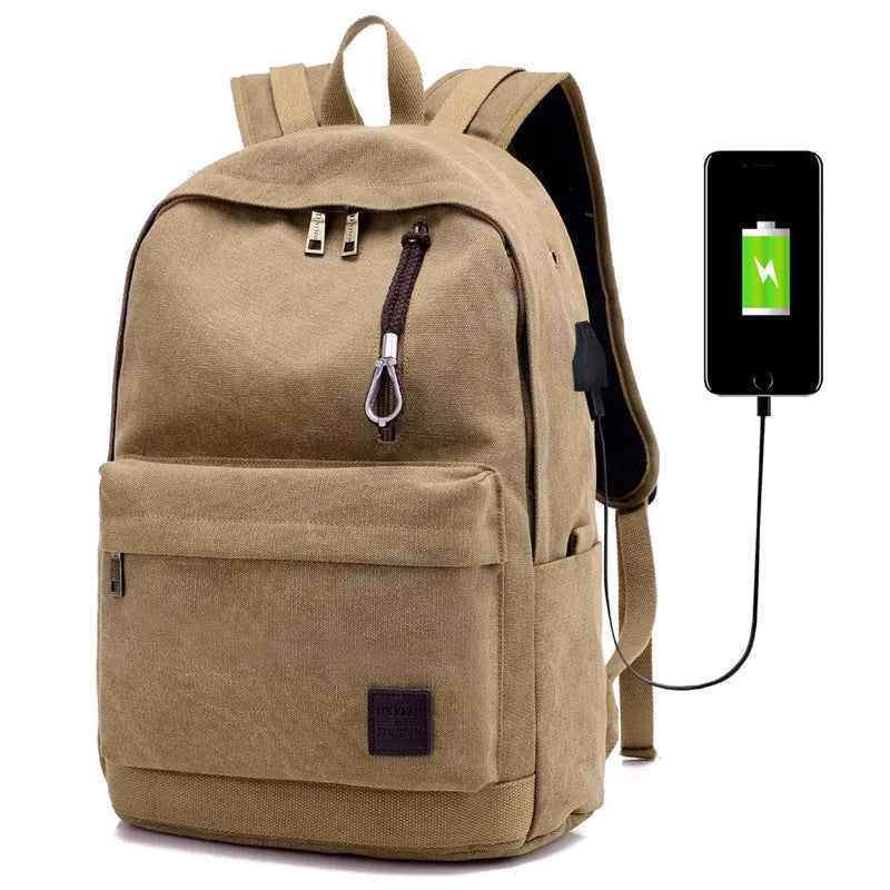 Canvas backpack with USB charging port showing multiple compartments including laptop section