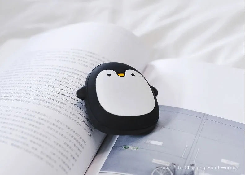 Cartoon penguin and polar bear USB rechargeable hand warmers showing front design