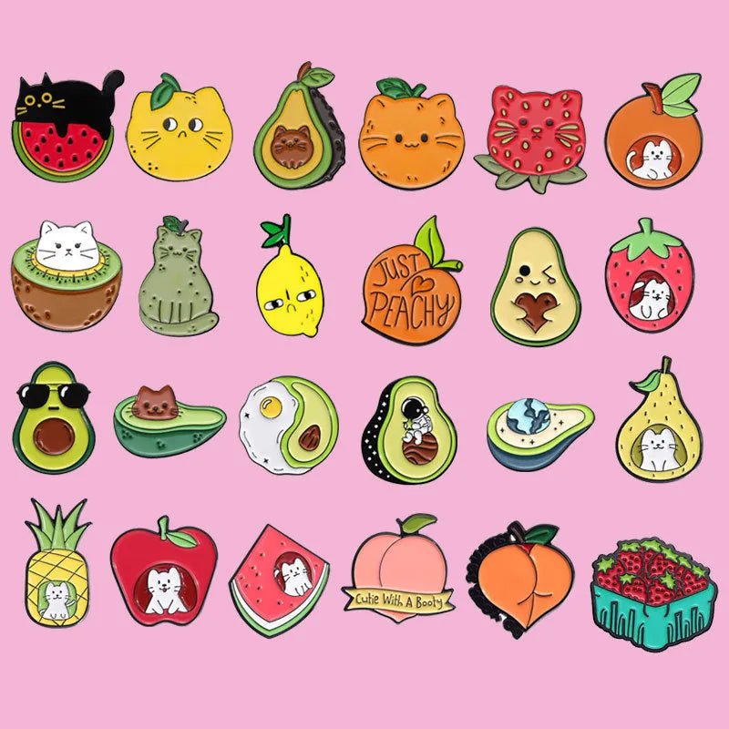 Colourful cartoon fruit design on a silver-toned zinc alloy metal brooch with pin clasp.