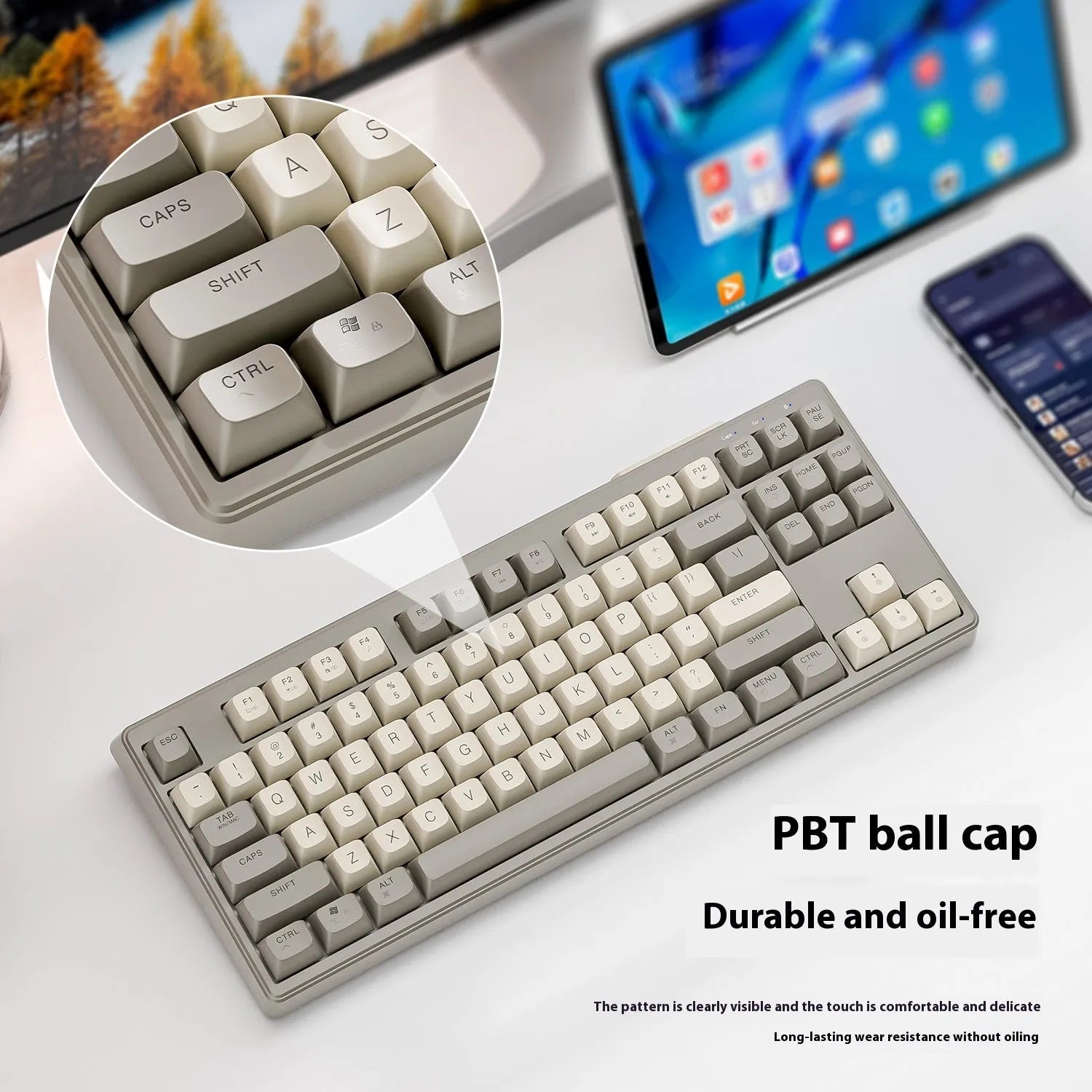 Free Wolf M87 wireless Bluetooth keyboard in blueberry colour on a desk with USB receiver and cable.