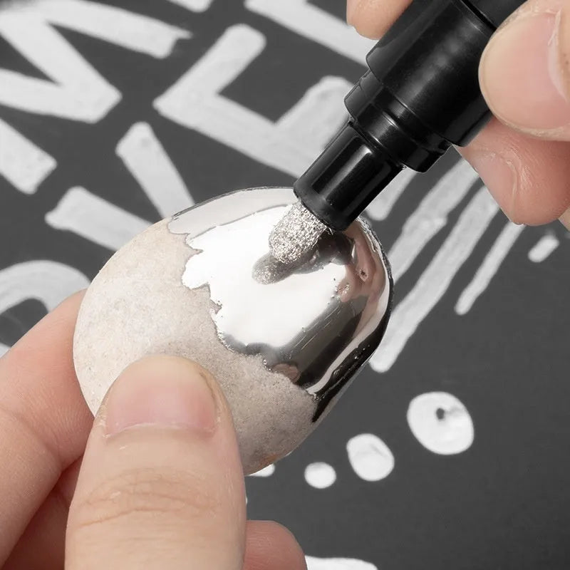 A plastic waterproof marker pen for writing on glass and mirrors, showing 1mm and 2mm tip size options.