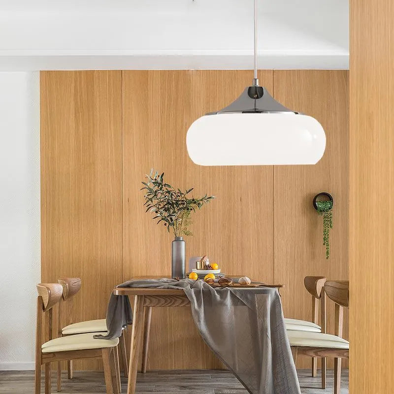 Bauhaus pendant light with three milk white egg tart glass shades for ceiling mounting