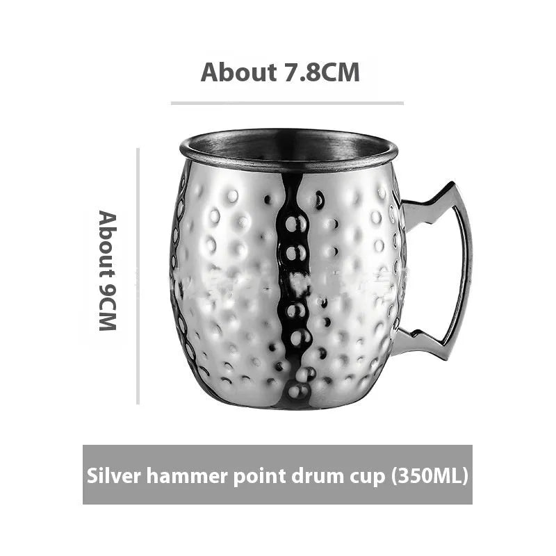 Stainless steel Moscow Mule cup with copper plating in hammer point style showing metallic finish.