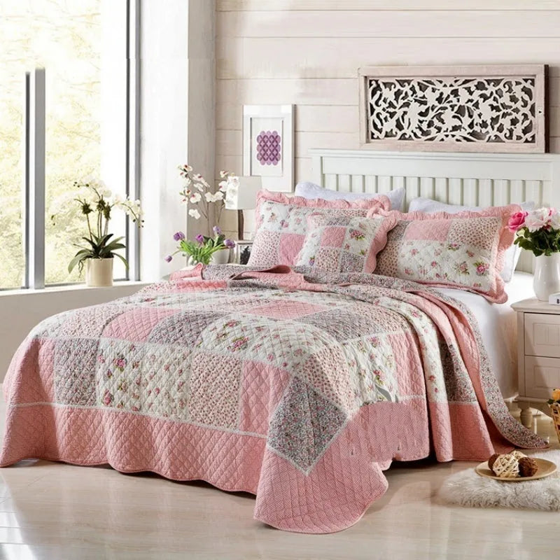 Pure cotton quilted bedspread and pillowcase set in a chosen pattern, laid flat on a bed.