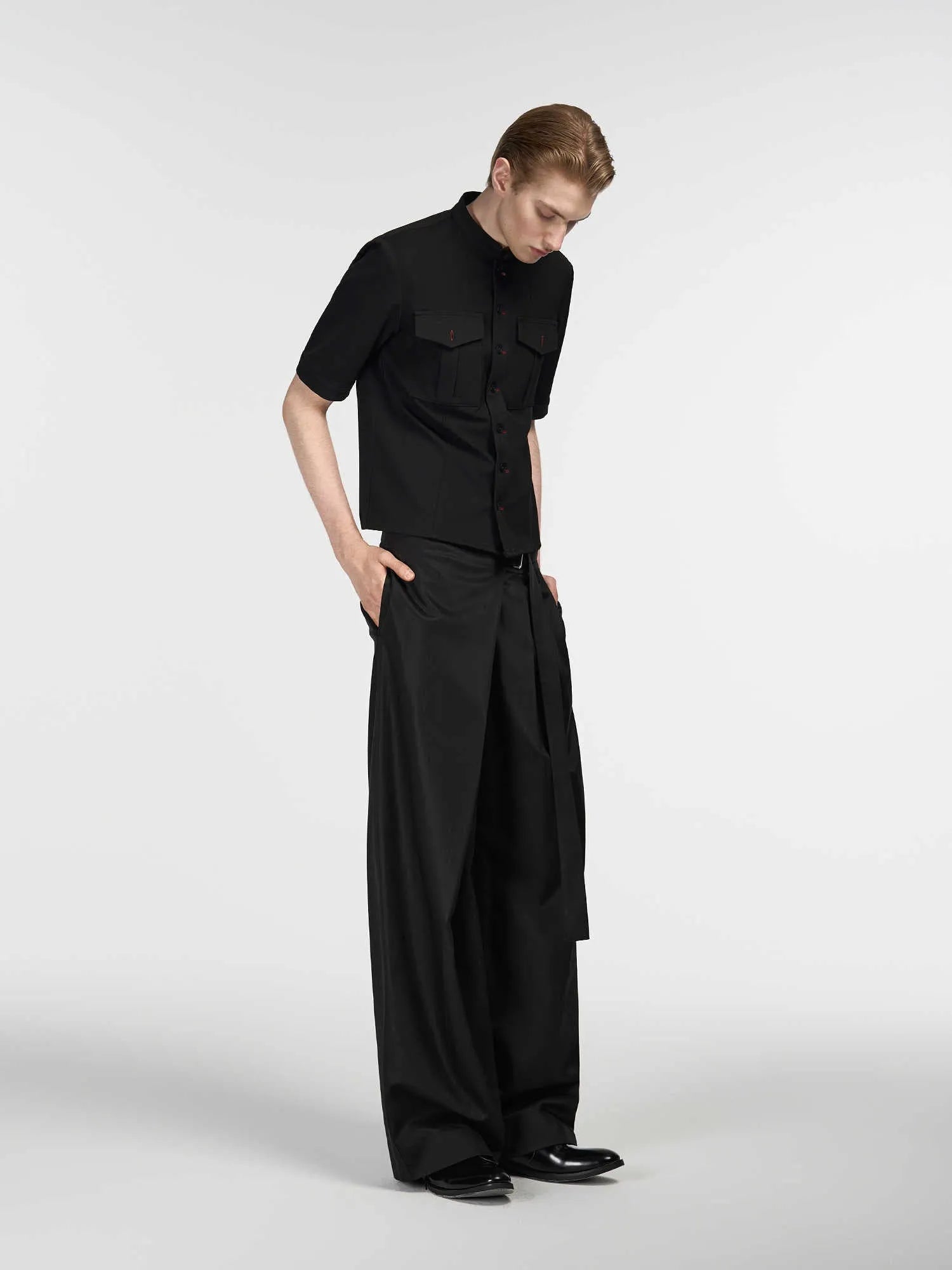 Black women's straight-leg trousers with single pleat front and adjustable waistband