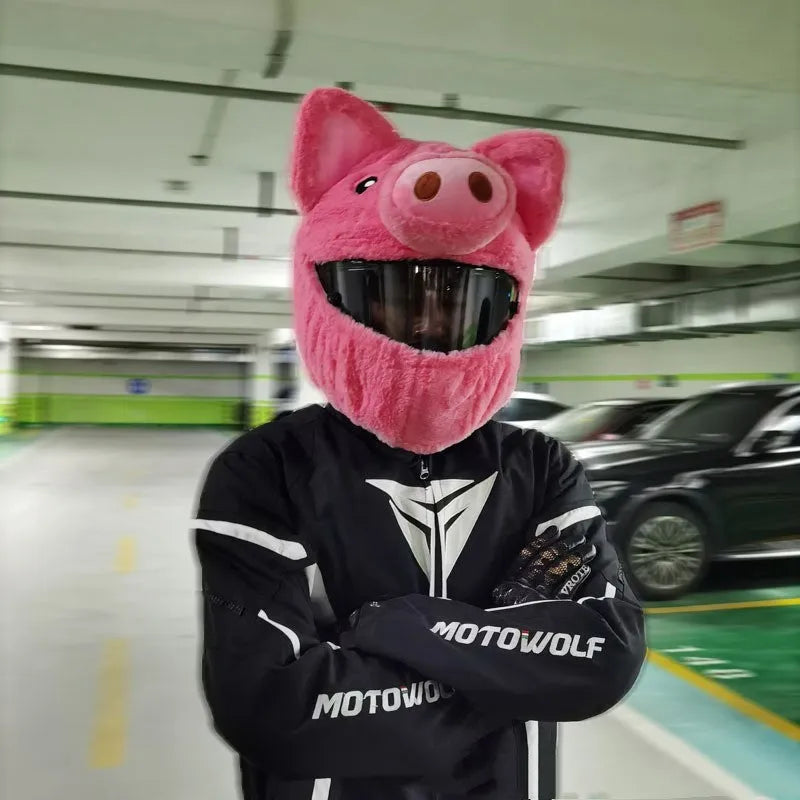 Pink plush cartoon-style protective hood for helmets on a white background.