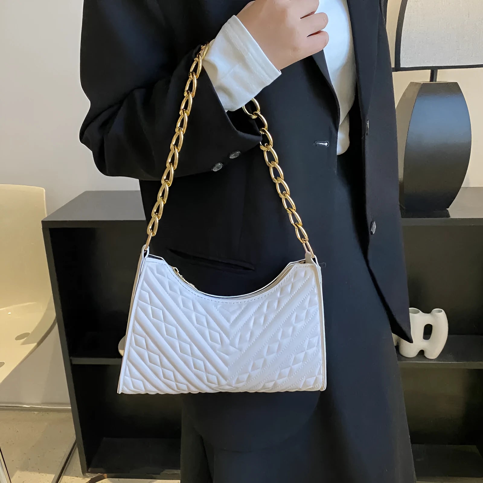 Brown PU leather pleated chain baguette shoulder bag with adjustable strap and soft carry handle
