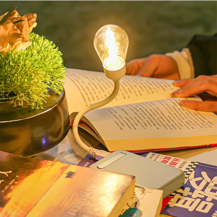USB rechargeable folding night light with tungsten filament bulb in compact folded position