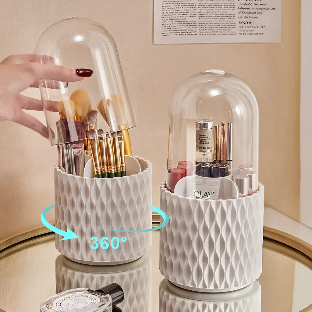 White acrylic rotating makeup brush holder with transparent dust cover on desktop