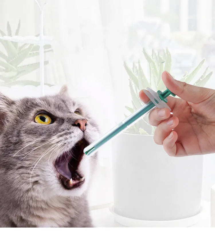 Two pet pill shooters with soft silicone tips for cat and dog medication administration