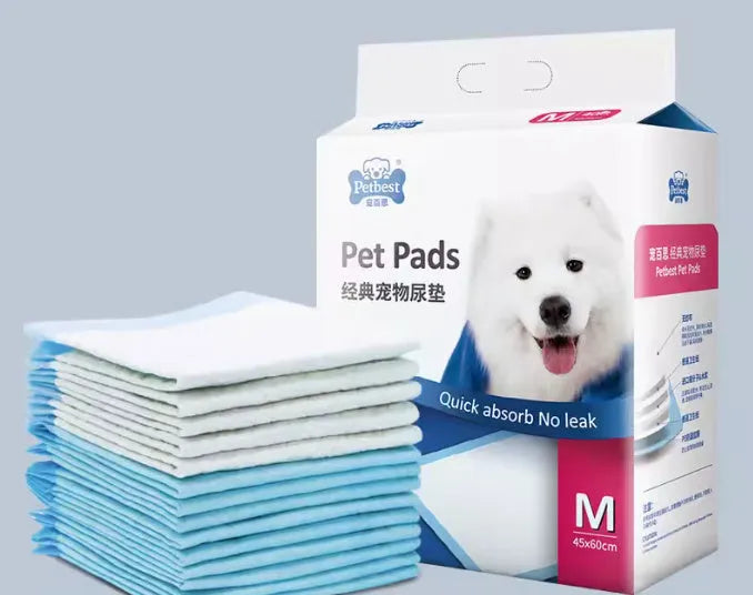 Pack of thickened dog urine pads showing adhesive strips and size comparison between S, M, L, and XL options