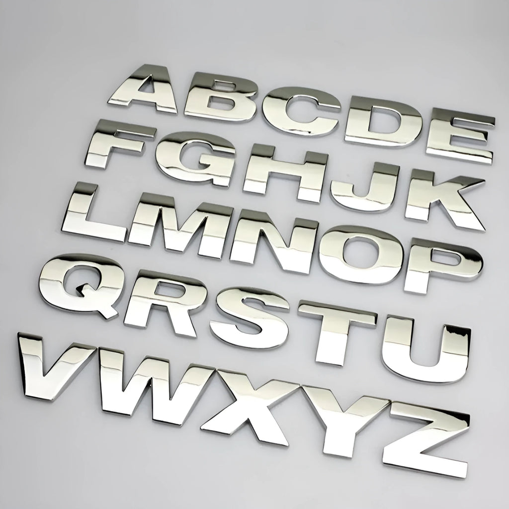 Metal car bumper stickers showing 3D raised English alphabet letters in silver finish