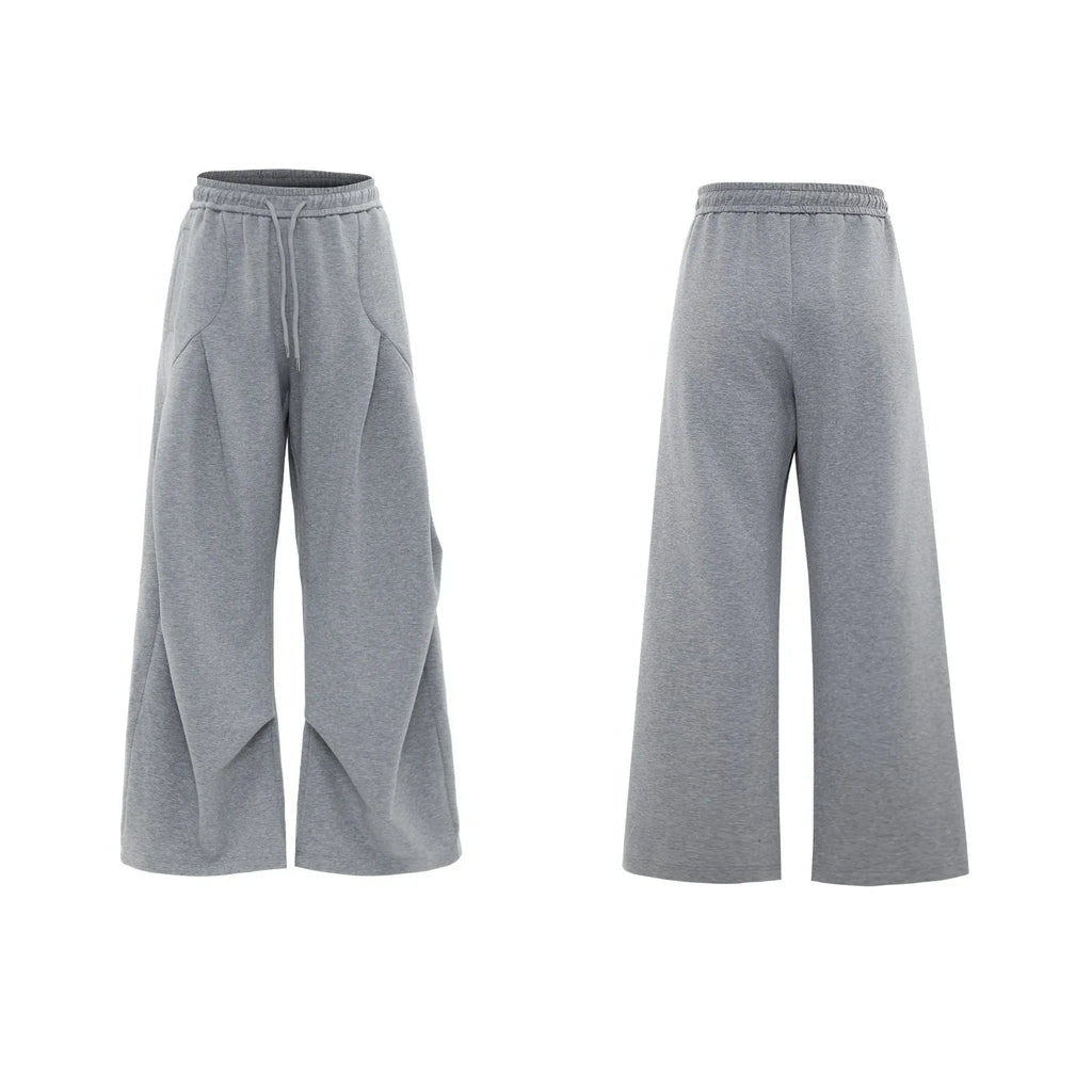 Men's dark grey cotton sports suit with V-neck jacket, padded shoulders, metal embellishments and matching shorts