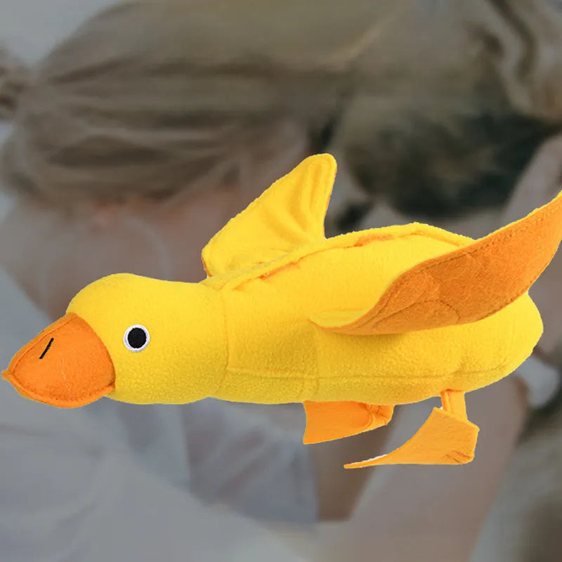Yellow teddy pet toy with attached duck doll and built-in dog sound mechanism