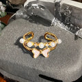 Copper adjustable ring with gourd design, flower and bow shapes, inlaid zircon detailing