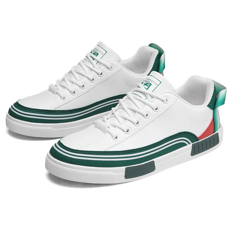 Men's white and green canvas casual shoes with mesh panels and a flat heel.