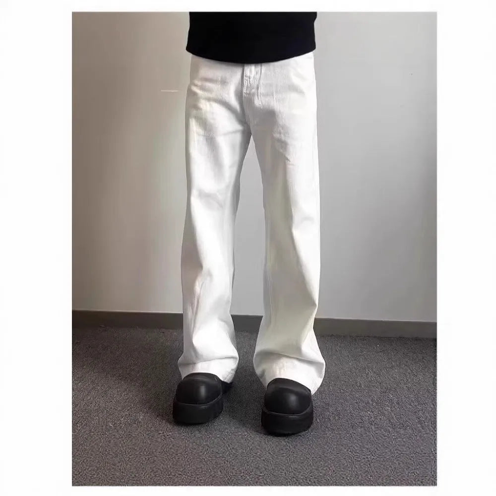 Men's white straight-leg denim jeans with loose wide-leg cut and mid-waist design