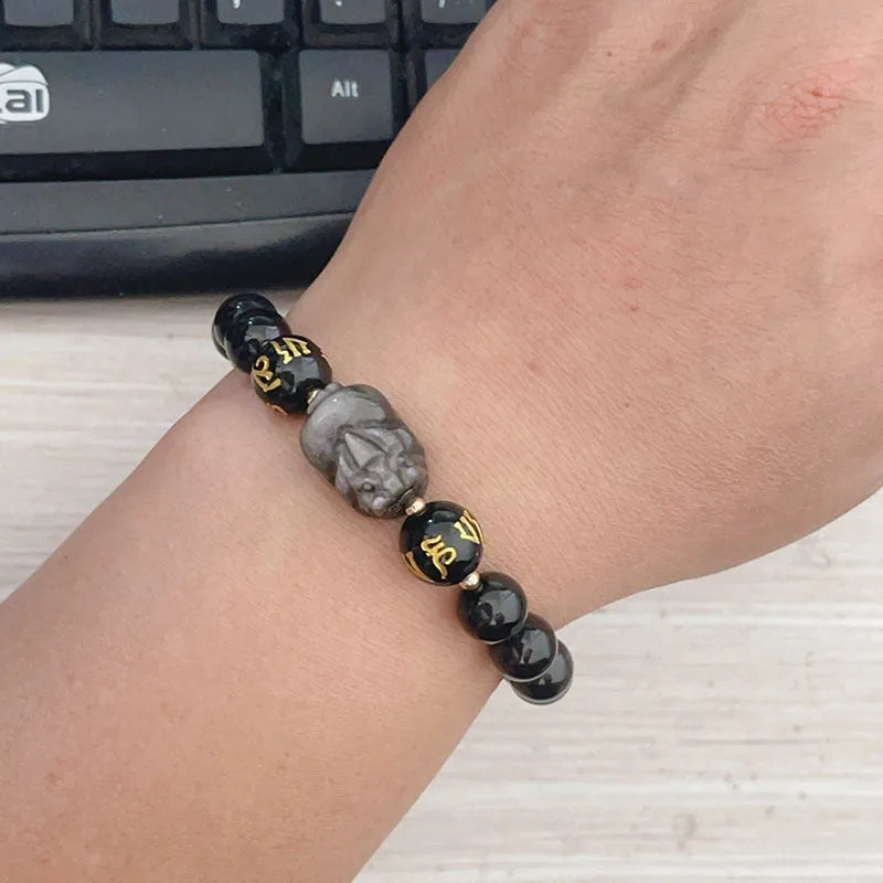 Man's Silverstone beaded bracelet with engraved Chinese proverbs and zodiac symbols.
