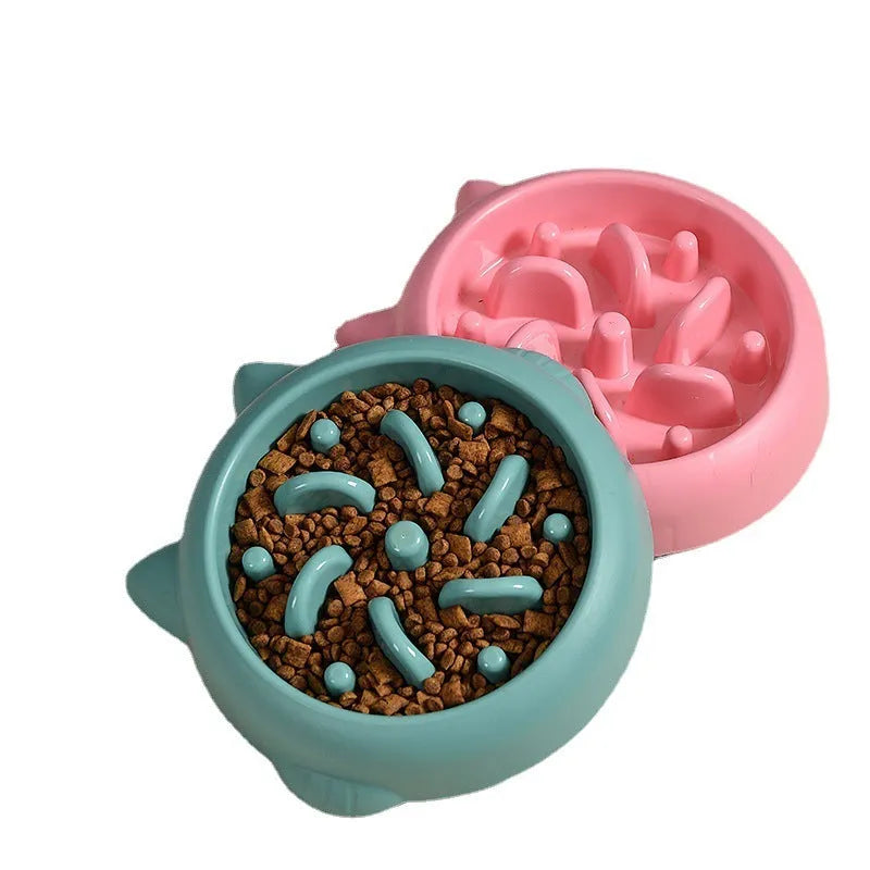 Bone-shaped slow feeder pet bowl in PP plastic showing interior maze design for slower eating