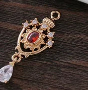 Hollow water drop shaped pendant with micro inlaid zircon on a crown outline in five colour options.