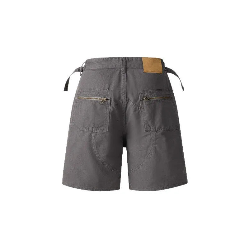 Retro washed cotton shorts for men and women in a loose fit with a zipper, shown in available colours.
