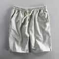 Men's striped casual cotton shorts with an elastic waistband shown in multiple colour options.