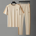 Men's ice silk style short sleeve sports suit in blue, apricot, or black with breathable polyester fabric