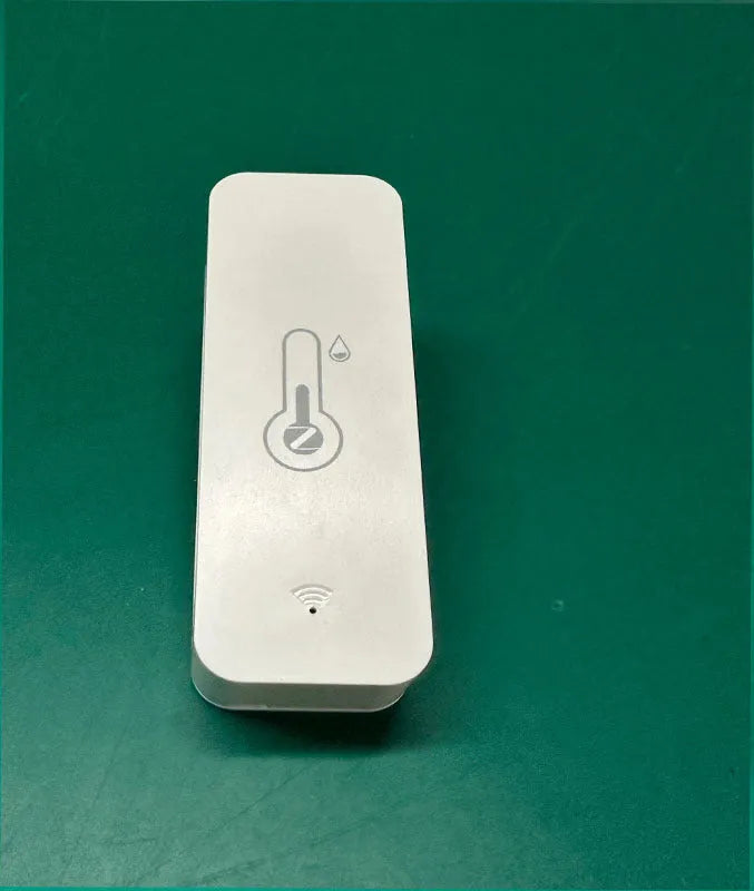 White WiFi temperature and humidity sensor with compact rectangular ABS housing
