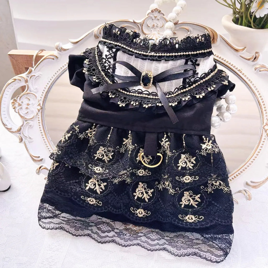 Gold Gothic princess style dress for a small dog or cat on a mannequin.
