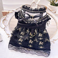 Gold Gothic princess style dress for a small dog or cat on a mannequin.