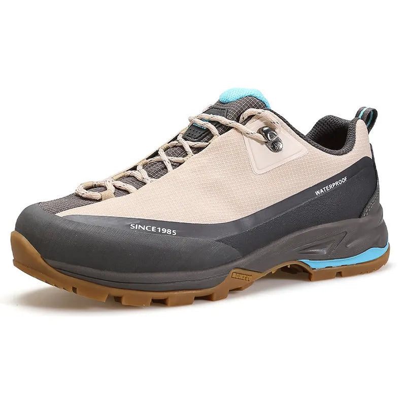 Men's low-top mountain climbing shoes in black with non-slip rubber outsole and lace-up design