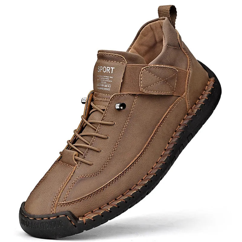 Men's mid-top Martin boot in khaki colour with tooling stitching on the rubber sole.