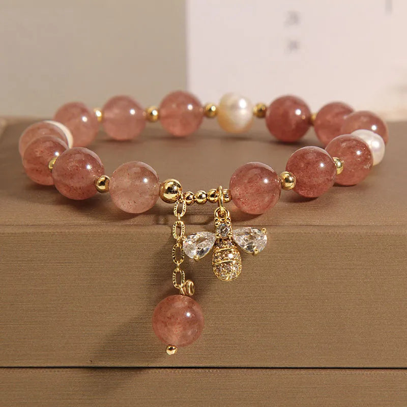 Women's freshwater pearl and strawberry quartz bracelet with zircon details on alloy chain