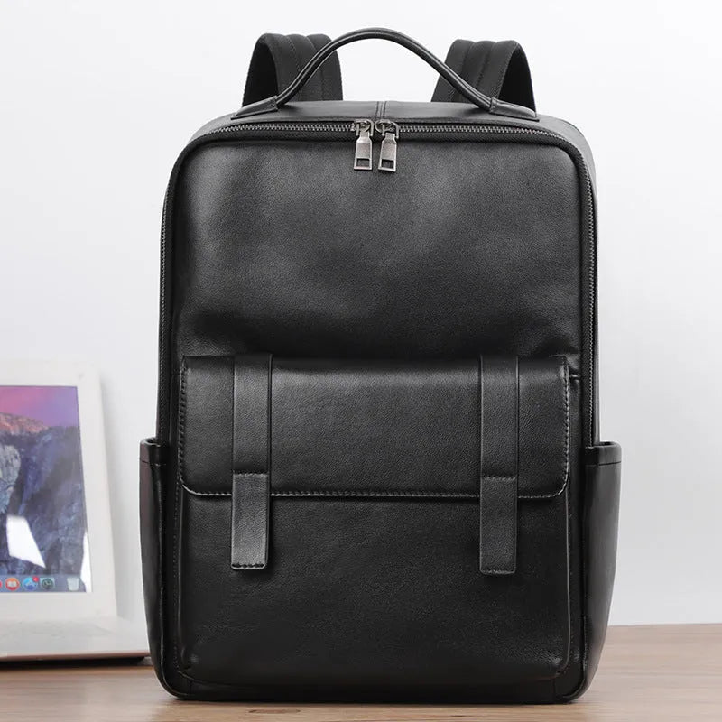 Black genuine leather men's computer backpack with woven details and ergonomic back plate