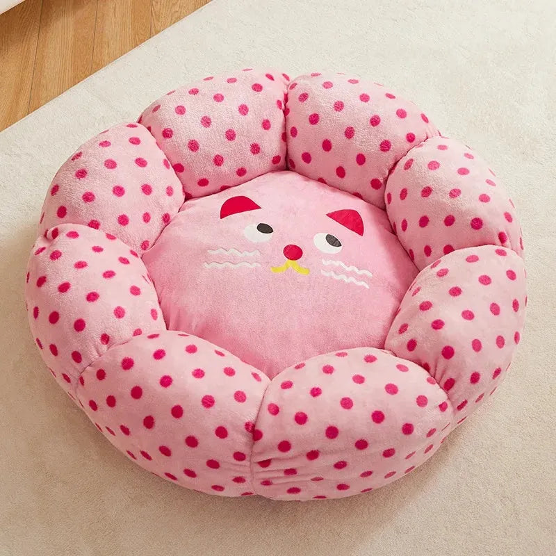 Pink dot patterned fabric cat bed shown in two sizes: 45cm and 65cm diameter.