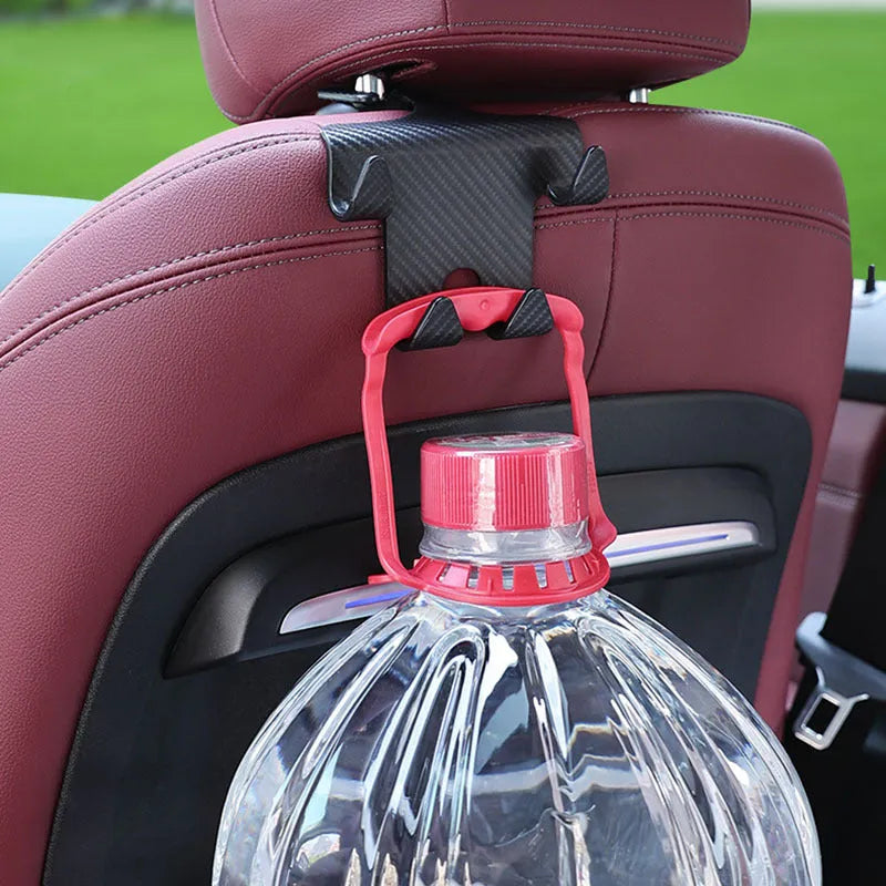 Black ABS plastic car hook and mobile phone bracket organiser for rear seat storage.