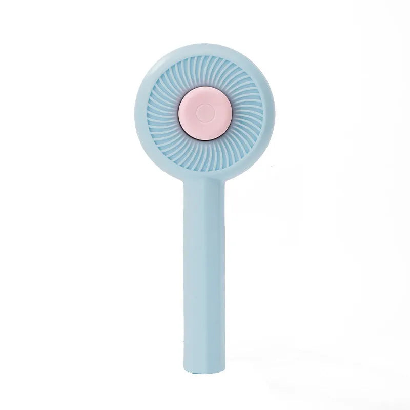 Blue pet grooming brush with metal angled needles and a self-cleaning button on the plastic handle.