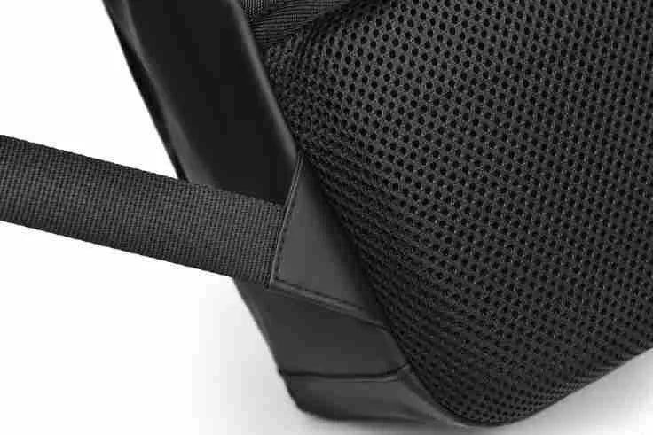 Waterproof laptop backpack in black showing large main compartment and simple design with sewing thread detailing
