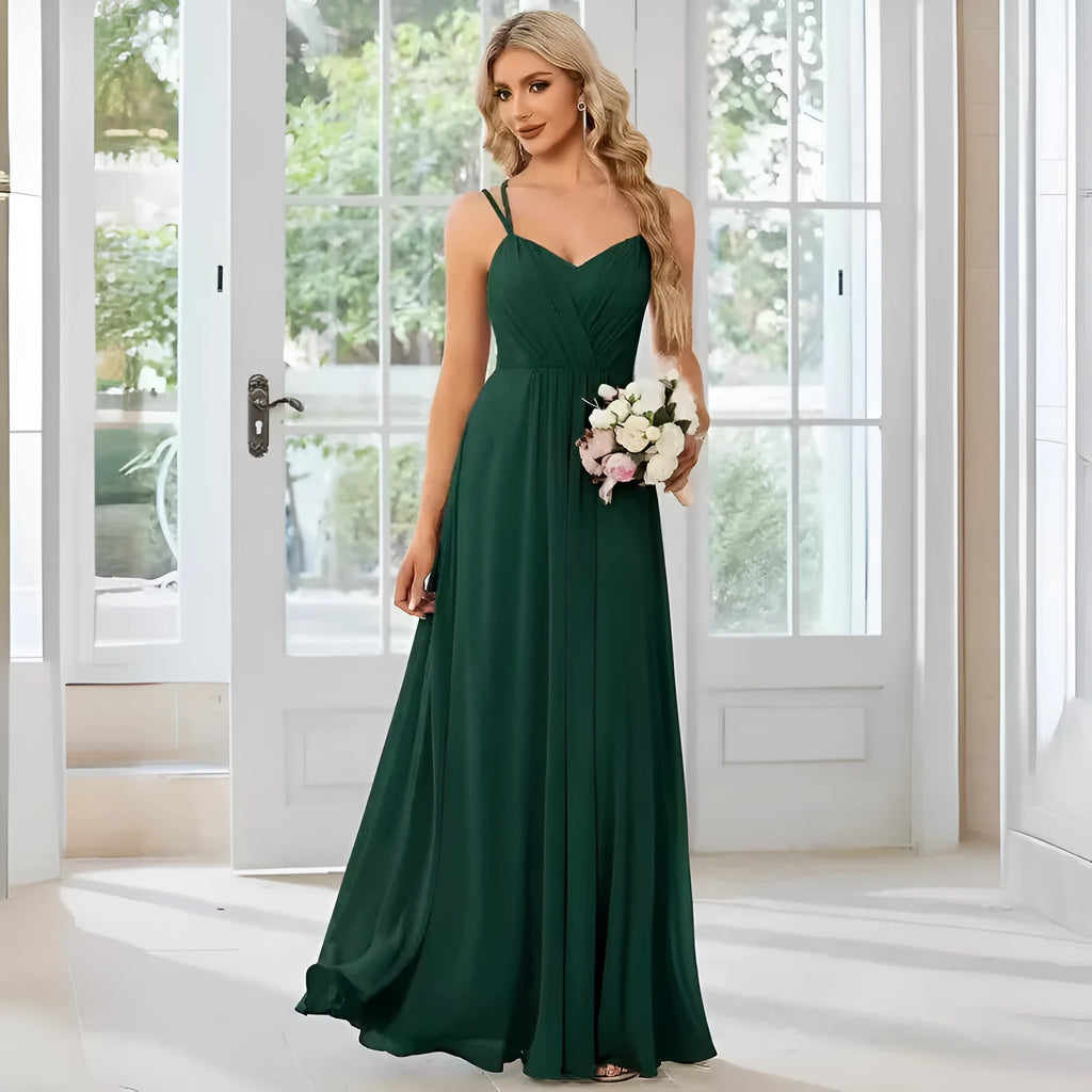 Women's sleeveless pleated A-line long dress in light green, shown in a solid colour with a long skirt.