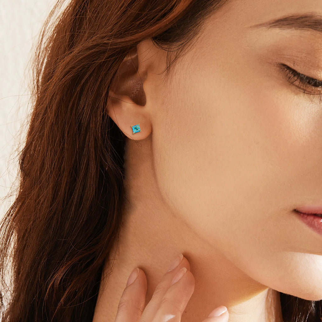Brass gold-plated drop earrings with pear-shaped candy-coloured zircon stones