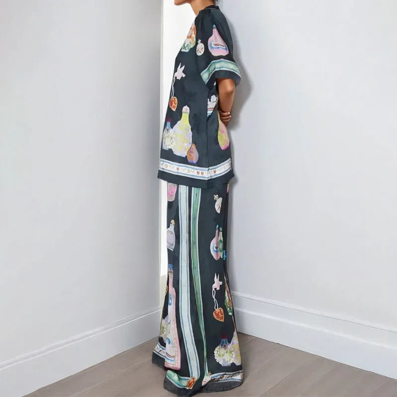 Black women's cartoon print casual set with cardigan and matching trousers