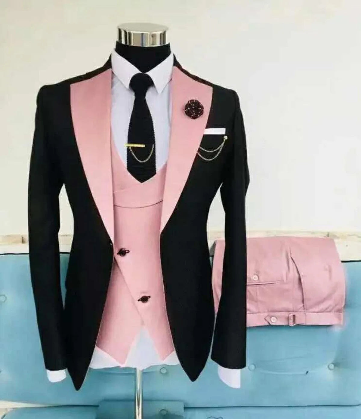 Men's slim fit three-piece business suit in black, shown with coat, vest, and trousers.