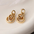 Geometric copper earrings with 18K gold plating in irregular shapes approximately 20-24cm long