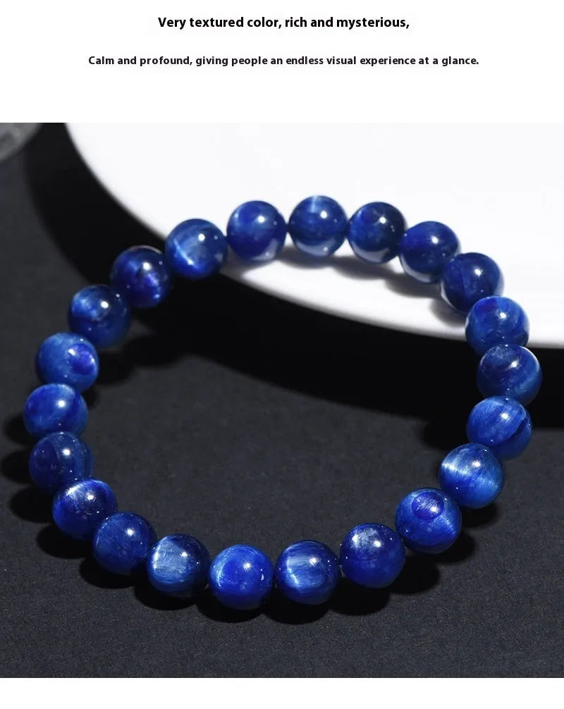 A blue crystal ball bracelet with a geometric shape and traditional Ruyi design elements.
