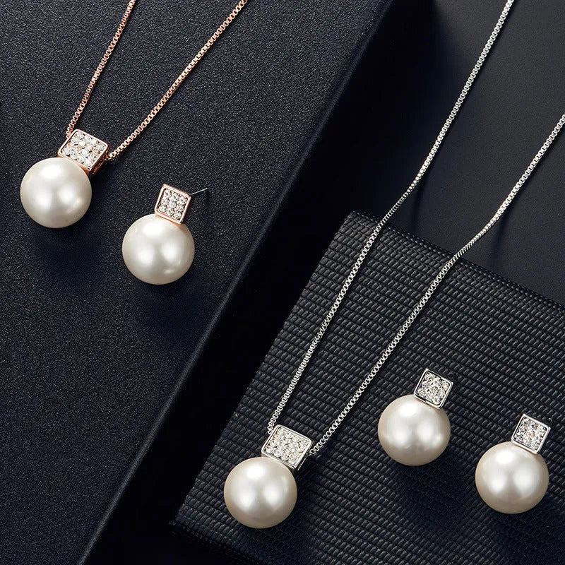 Versatile square pearl earring necklace jewellery set in rose gold with rhinestone cube details and box chain