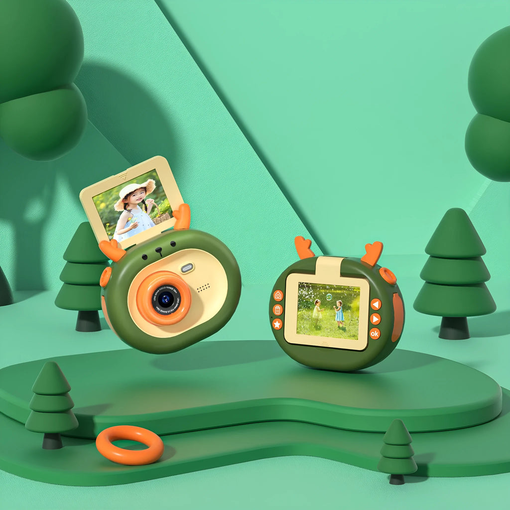 Purple and dark green children's digital camera with flip screen showing game interface and USB charging cable