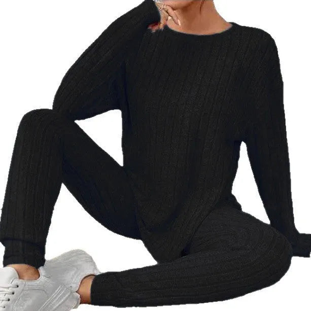 Women's black sunken stripe two-piece homewear set with matching trousers and top