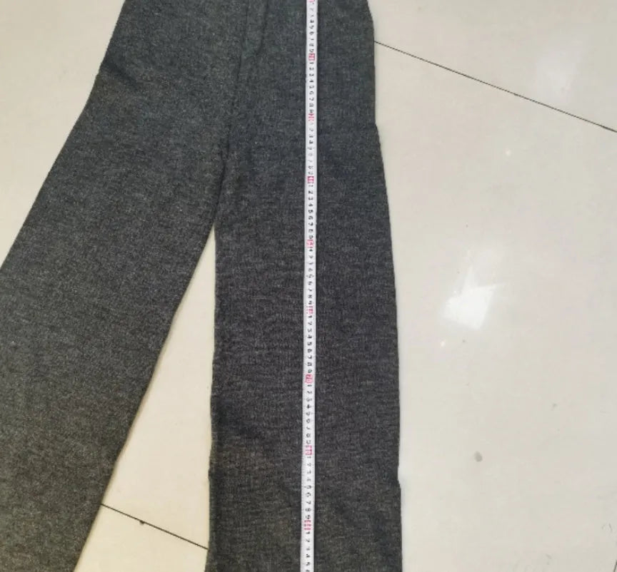 Women's acrylic suit set with side-slit sweater and trousers in solid colour